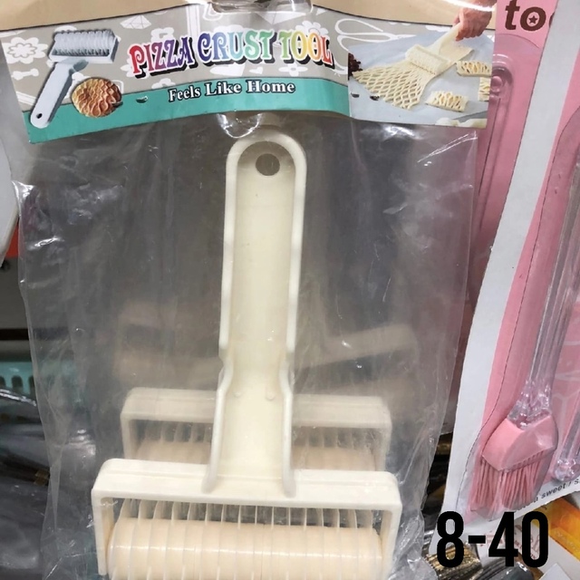 Нож ролик для фигурной нарезки теста 23048700